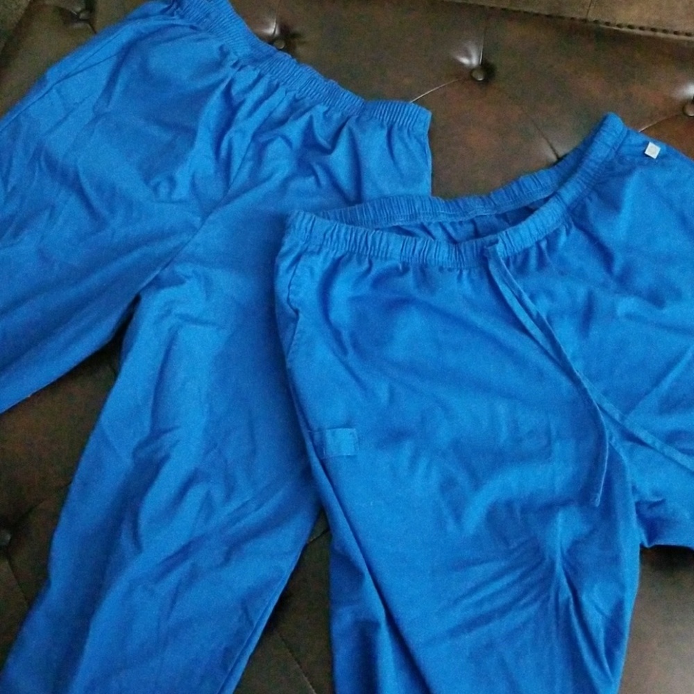 Two pairs blue scrub pants..good condition